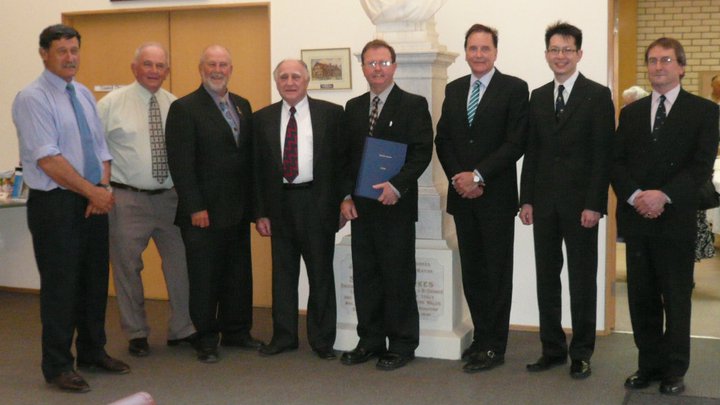 Dr Ian Cooper (centre) flanked by Dr Brenden Tempest-Mogg, Dr Julian Ng, and Dr Ray Morland, with Cr Ken Keith (Parkes Mayor), and other dignitaries in Parkes, New South Wales