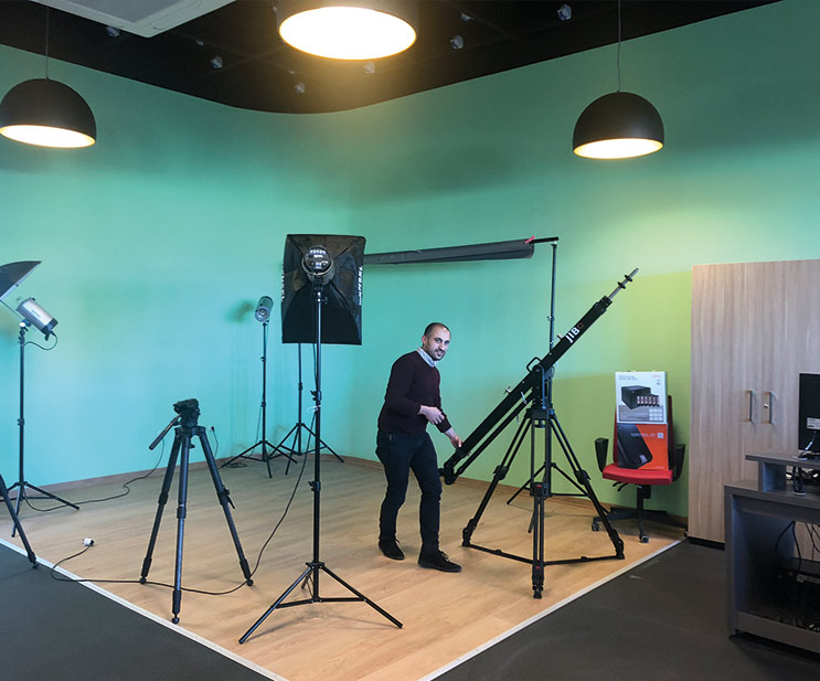 Clint Attard showcases the photographic and film studio and the green screen