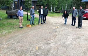 Participants playing a traditional Finnish game called mölkky