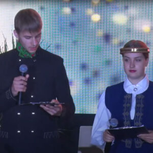 Students in traditional Latvian costume introduce food of the Kurzeme region